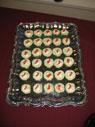 cucumber slice with spiced goat cheese and smoked salmon